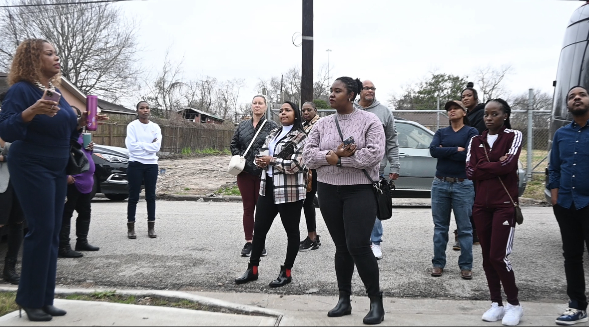 Candra Brown leading a Coffee & Construction site tour in Houston