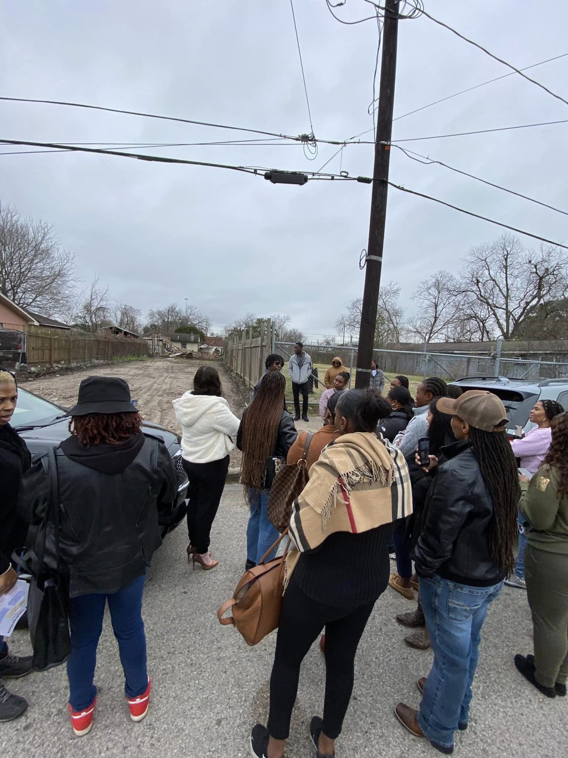 Attendees walking a BEDDIEO build site in Houston